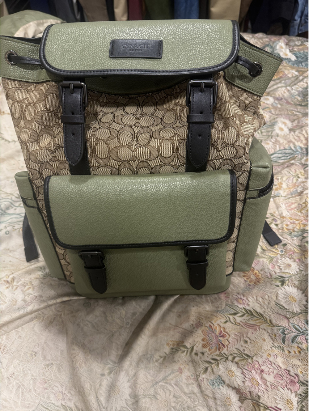 Coach Monogram Leather Backpack with Multiple Pockets and Adjustable Straps
